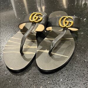 Gucci Women's Sandals in Black with Gold Accents